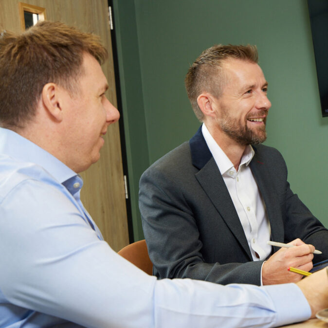 DJH Perspective Wealth Management advisers at a meeting